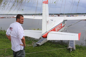 Rob Galloway, who is responsible for day-to-day operations at Jones Brothers & Co. Air and Seaplane Adventures in Tavares, stands behind a seaplane.
