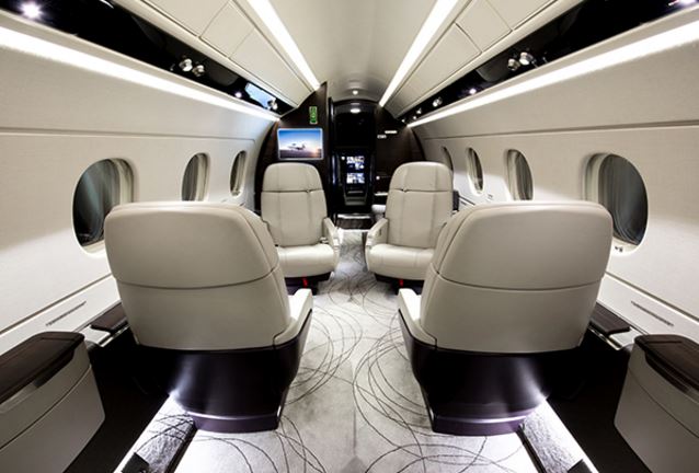 Cabin of the Legacy 450 for charter by Solairus Aviation